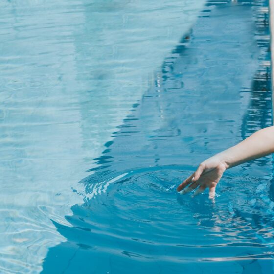 woman-relaxing-next-to-pool (1)